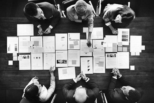 Business People Analyzing Statistics Financial Concept